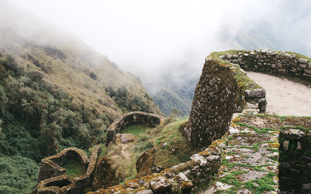 Cobble stone wall ruins and mist