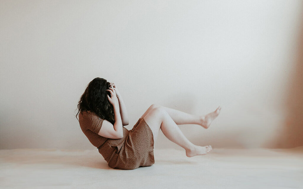 Woman lying on floor